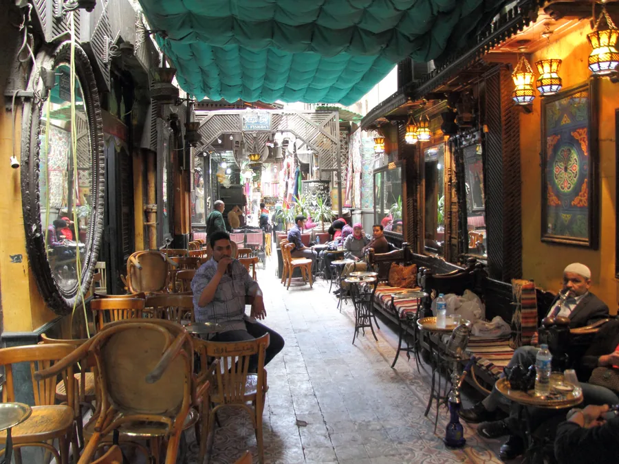 Lanterns and cafés in the old streets of Cairo at night